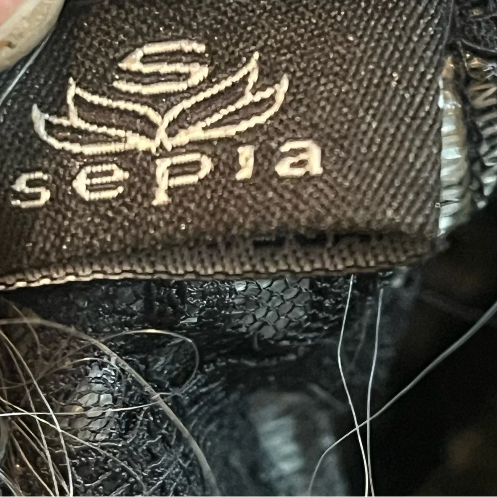 sephia preowned 1881